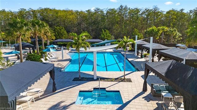 28405 Abruzzo Dr, Bonita Springs, FL 34135 Lap pool and community hot tub.