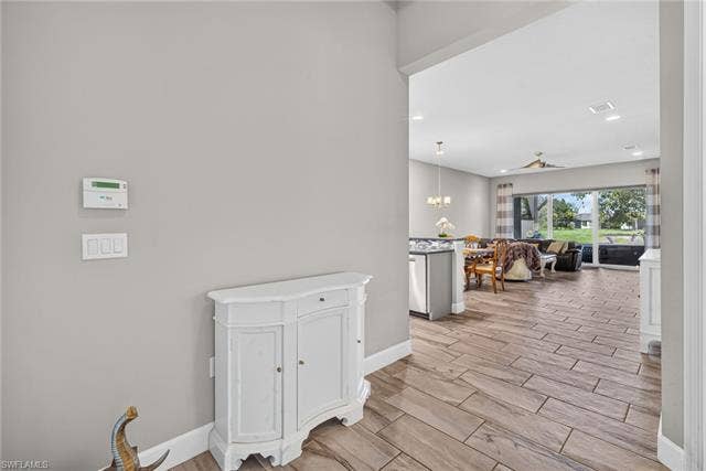 28405 Abruzzo Dr, Bonita Springs, FL 34135 Upon entry you can see all the way to the amazing extended, screened lanai area!!