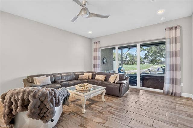 28405 Abruzzo Dr, Bonita Springs, FL 34135 The hot tub is negotiable! Room on this extended lanai for hot tub, sitting area, and eating area! WOW!
