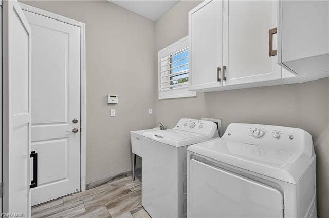 28405 Abruzzo Dr, Bonita Springs, FL 34135 Built-in cabinets for additional storage, plantation shutters to match all other windows and a utility sink. What more could you ask for? BTW, you can't see to appreciate the tankless hw tank or the whole house generator!