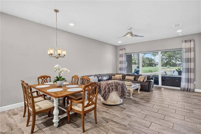 28405 Abruzzo Dr, Bonita Springs, FL 34135 Dining area and living area seamlessly blend for maximum utility and features. Neutral colors ready for you to just move in and begin enjoying all VB has to offer!