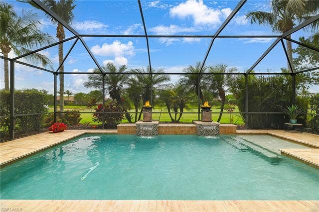 28522 Westmeath Ct, Bonita Springs, FL 34135 Custom Pool with Sun shelf and Fire Bowls.