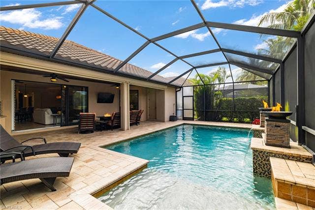 28522 Westmeath Ct, Bonita Springs, FL 34135 Custom Pool with Sun shelf and Fire Bowls.