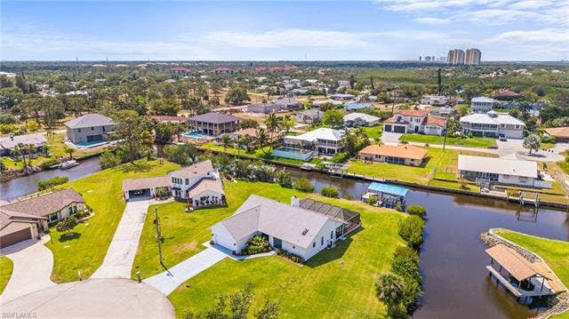 20640 Porthole Ct, Estero, FL 33928 Drone / aerial view featuring a water view and a residential view