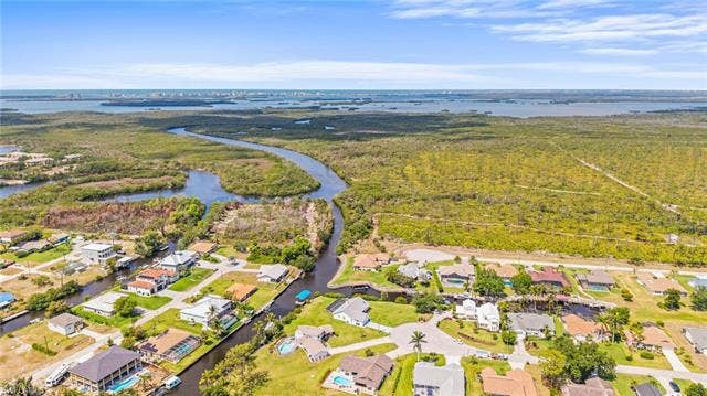 20640 Porthole Ct, Estero, FL 33928 Drone / aerial view featuring a residential view and a water view