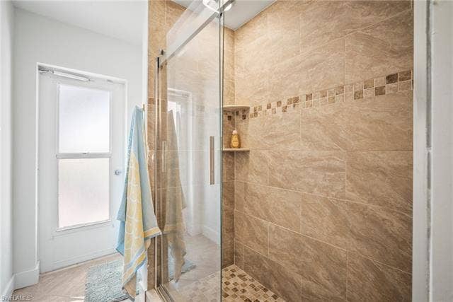 20640 Porthole Ct, Estero, FL 33928 Bathroom with plenty of natural light and a shower stall