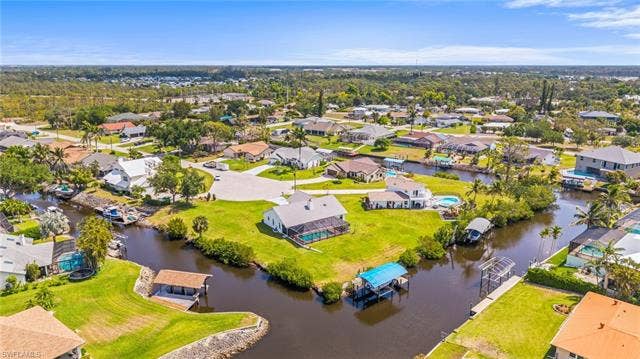 20640 Porthole Ct, Estero, FL 33928 Bird's eye view with a water view and a residential view