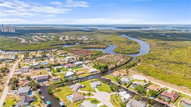 20640 Porthole Ct, Estero, FL 33928 Drone / aerial view featuring a residential view and a water view