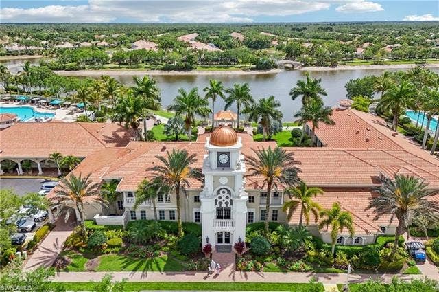 15059 Blue Marlin Ter, Bonita Springs, FL 34135 Luxurious Club house, clock tower, copper dome, and red tile roofing