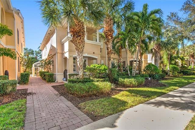15059 Blue Marlin Ter, Bonita Springs, FL 34135 Laundry area featuring white cabinetry, a utility.& laundry Tub.sink, and a countertop