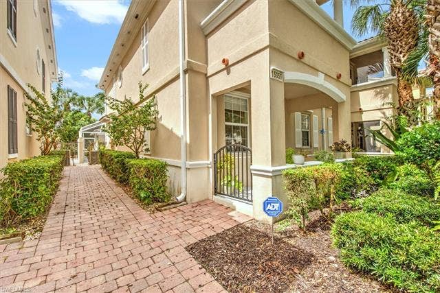 15059 Blue Marlin Ter, Bonita Springs, FL 34135 End private unit all Divosta builder poured concrete townhome . Brick paver walkway with landscaping Maint free lifestyle association Maintains the lawn shrubs, trees plants exterior pest mulch,irrigation.
