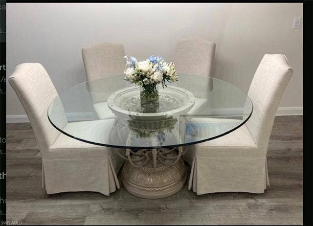 15059 Blue Marlin Ter, Bonita Springs, FL 34135 4 chairs total . Round glass table with solid base.