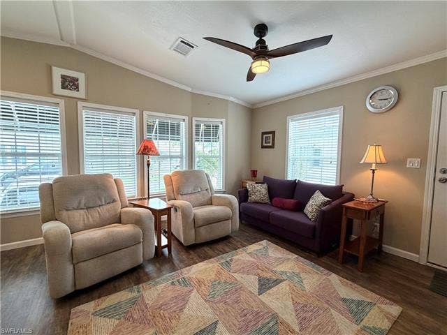 4710 W Lafayette Ln, Estero, FL 33928 Wood-finish flooring with crisp white trim
