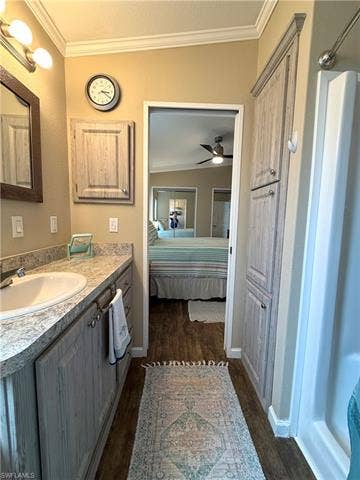 4710 W Lafayette Ln, Estero, FL 33928 Bathroom vanity with an integrated sink and textured countertop