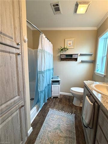 4710 W Lafayette Ln, Estero, FL 33928 Wood-finish flooring with a built-in linen cabinet