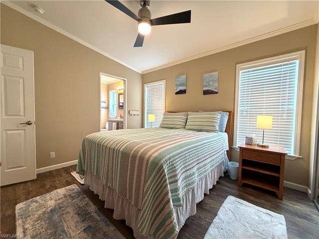 4710 W Lafayette Ln, Estero, FL 33928 Wood-finish flooring, ceiling fan, and crown molding
