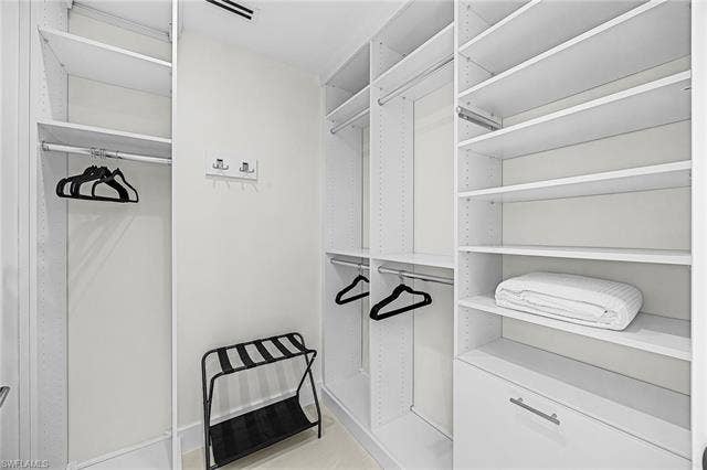 455 Palermo Cir, Fort Myers Beach, FL 33931 View of spacious closet - Virtually Edited Image