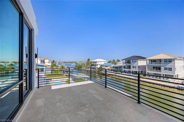 455 Palermo Cir, Fort Myers Beach, FL 33931 Balcony with a water view - Virtually Edited Image