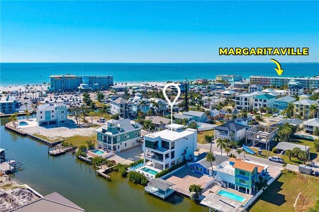 455 Palermo Cir, Fort Myers Beach, FL 33931 Bird's eye view of a nearby body of water - Virtually Edited Image