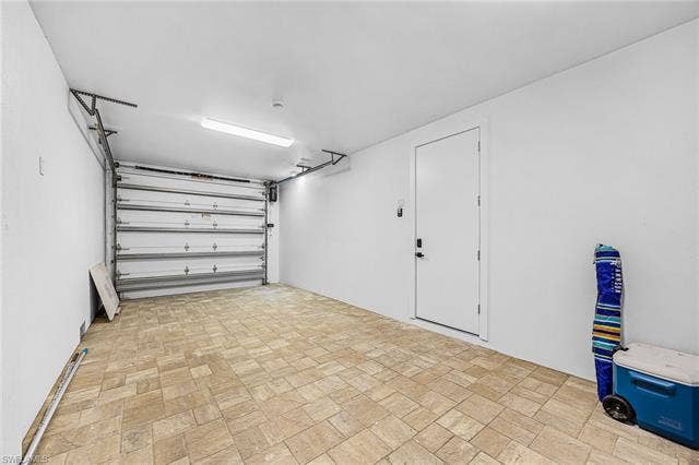 455 Palermo Cir, Fort Myers Beach, FL 33931 View of garage - Virtually Edited Image