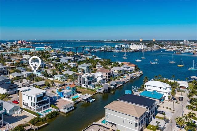 455 Palermo Cir, Fort Myers Beach, FL 33931 Bird's eye view of a large body of water - Virtually Edited Image
