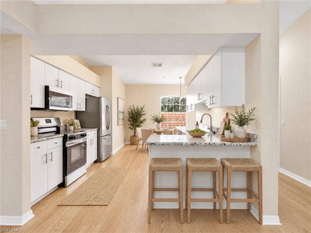 26740 Rosewood Pointe Ln, #205, Bonita Springs, FL 34135 Virtually staged