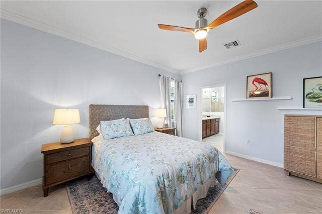 19712 The Place Blvd, Estero, FL 33928 Crown molding, tile flooring, and a ceiling fan with light fixture