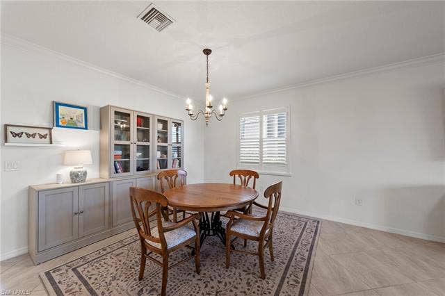 19712 The Place Blvd, Estero, FL 33928 Crown molding, plantation shutters and tile flooring