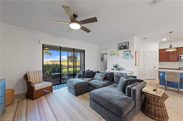 19712 The Place Blvd, Estero, FL 33928 Crown molding, motorized privacy shades with slider access to screened lanai.