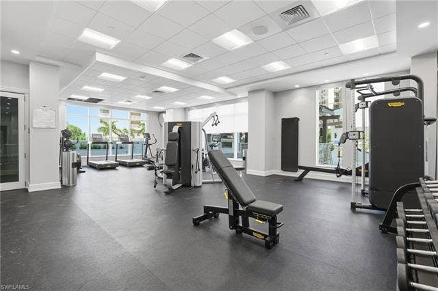 4142 Bay Beach Ln, #904, Fort Myers Beach, FL 33931 Exercise room featuring a paneled ceiling - Virtually Edited Image