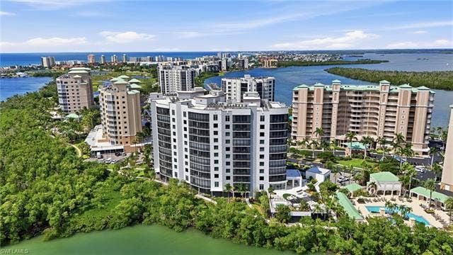 4142 Bay Beach Ln, #904, Fort Myers Beach, FL 33931 View of urban area featuring a large body of water - Virtually Edited Image
