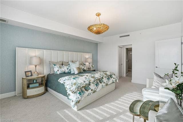 4142 Bay Beach Ln, #904, Fort Myers Beach, FL 33931 View of carpeted bedroom - Virtually Edited Image