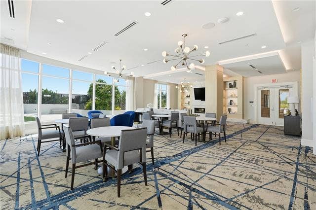 4142 Bay Beach Ln, #904, Fort Myers Beach, FL 33931 Dining room with recessed lighting - Virtually Edited Image