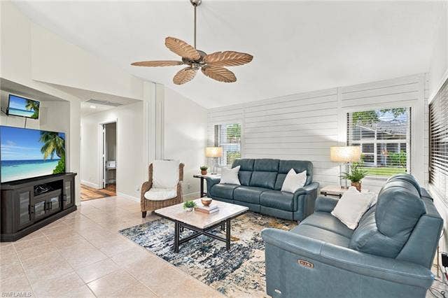 20052 Serene Meadow Ln, Estero, FL 33928 Vaulted ceilings, a decorative ceiling fan, and tile flooring