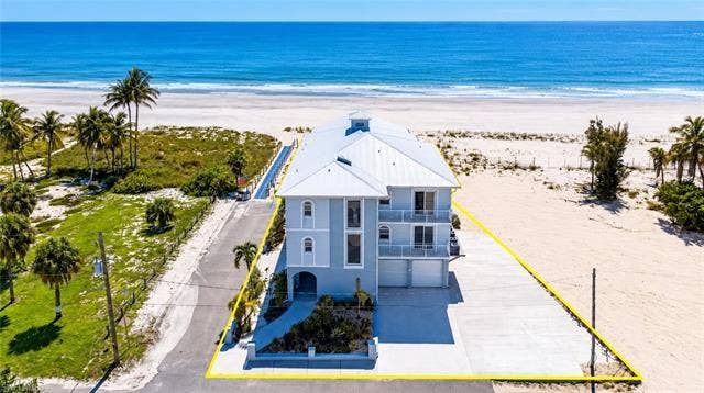 61 Mango St, Fort Myers Beach, FL 33931 Beachfront property with direct access to the sand -Image Virtually enhanced