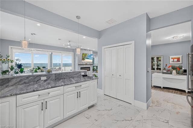 61 Mango St, Fort Myers Beach, FL 33931 Watch sunset while you meal prep - Virtually Edited Image