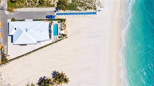 61 Mango St, Fort Myers Beach, FL 33931 White sand beachfront property-Image Virtually enhanced