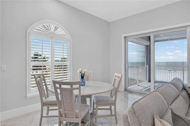 61 Mango St, Fort Myers Beach, FL 33931 Dine with the family overlooking the Gulf - Virtually Edited Image