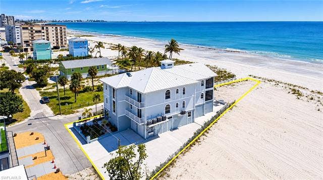 61 Mango St, Fort Myers Beach, FL 33931 Prestigious Gulf Front coastal residence -Image Virtually enhanced