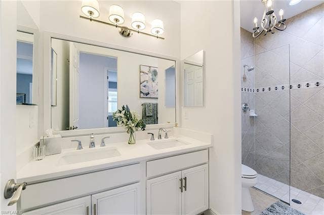 23472 Sanabria Loop, Bonita Springs, FL 34135 Luxurious Guest Bathroom with walk in shower and dual sinks!