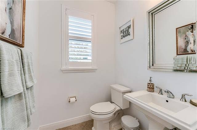 23472 Sanabria Loop, Bonita Springs, FL 34135 Half-bath for main living areas.