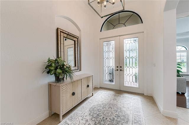 23472 Sanabria Loop, Bonita Springs, FL 34135 Gorgeous Glass leaded Double doors let in so much light while still maintaining privacy.