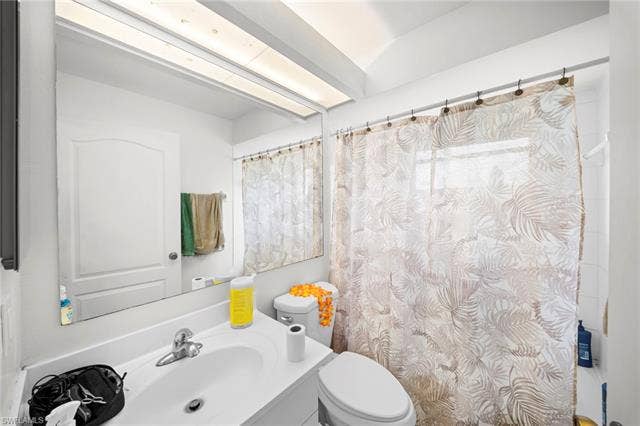 3730 21st Pl, Cape Coral, FL 33914 White vanity with integrated sink and chrome faucet