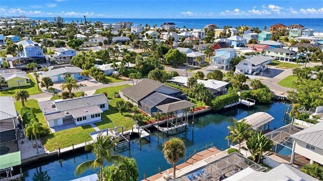 323 Washington Ct, Fort Myers Beach, FL 33931 A BIRDS-EYE VIEW OF YOUR CANAL-FRONT RETREAT.