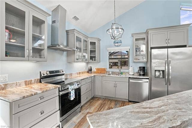 323 Washington Ct, Fort Myers Beach, FL 33931 BEAUTIFULLY UPDATED KITCHEN WITH NEW CABINETRY, GRANITE COUNTERTOPS AND BRAND NEW APPLIANCES.