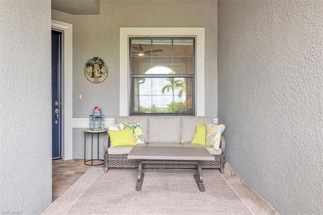 16782 Rolling Rock Blvd, Alva, FL 33920 Gated sitting area in entrance of home