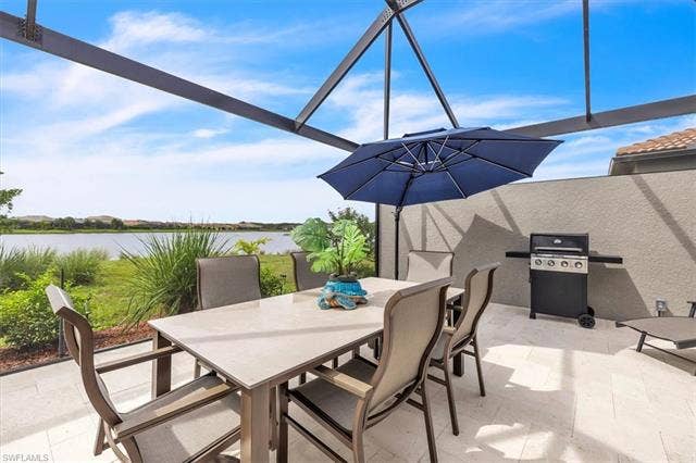 16782 Rolling Rock Blvd, Alva, FL 33920 Extended lanai with panoramic lake views