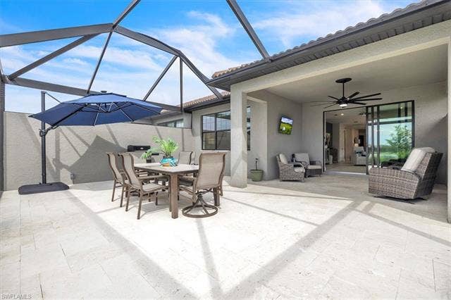 16782 Rolling Rock Blvd, Alva, FL 33920 Extended lanai with travertine tile