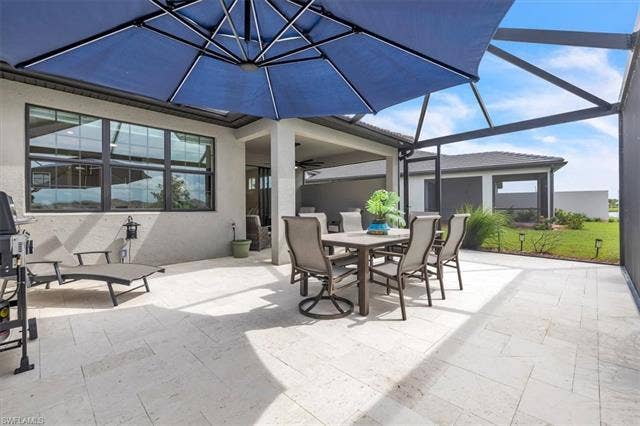 16782 Rolling Rock Blvd, Alva, FL 33920 Extended lanai with travertine tile