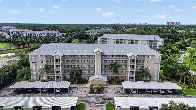 19870 Breckenridge Dr, #303, Estero, FL 33928 Building with covered parking and storage locker
